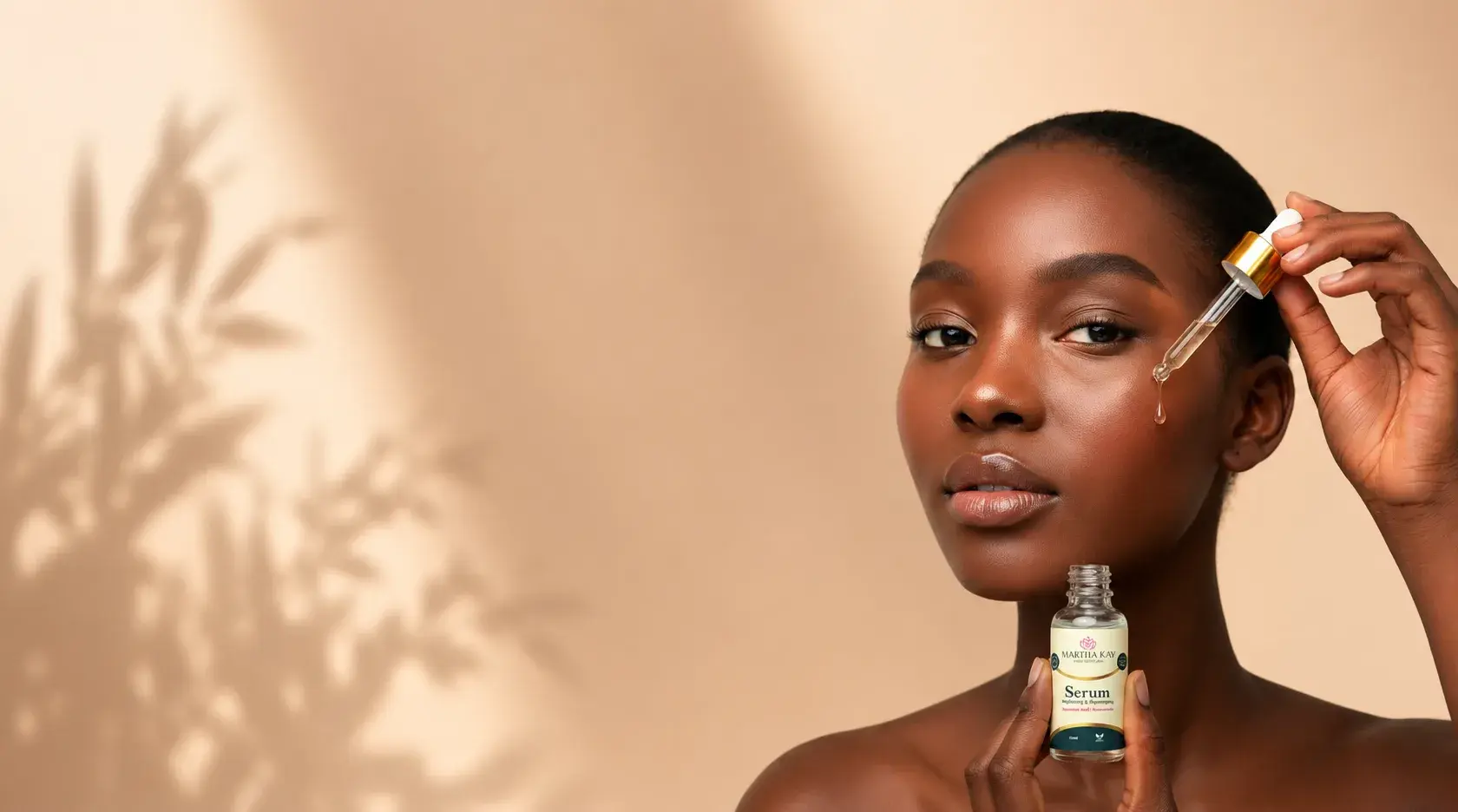 Woman holding the Martha Kay Hydrating Serum, dropper raised