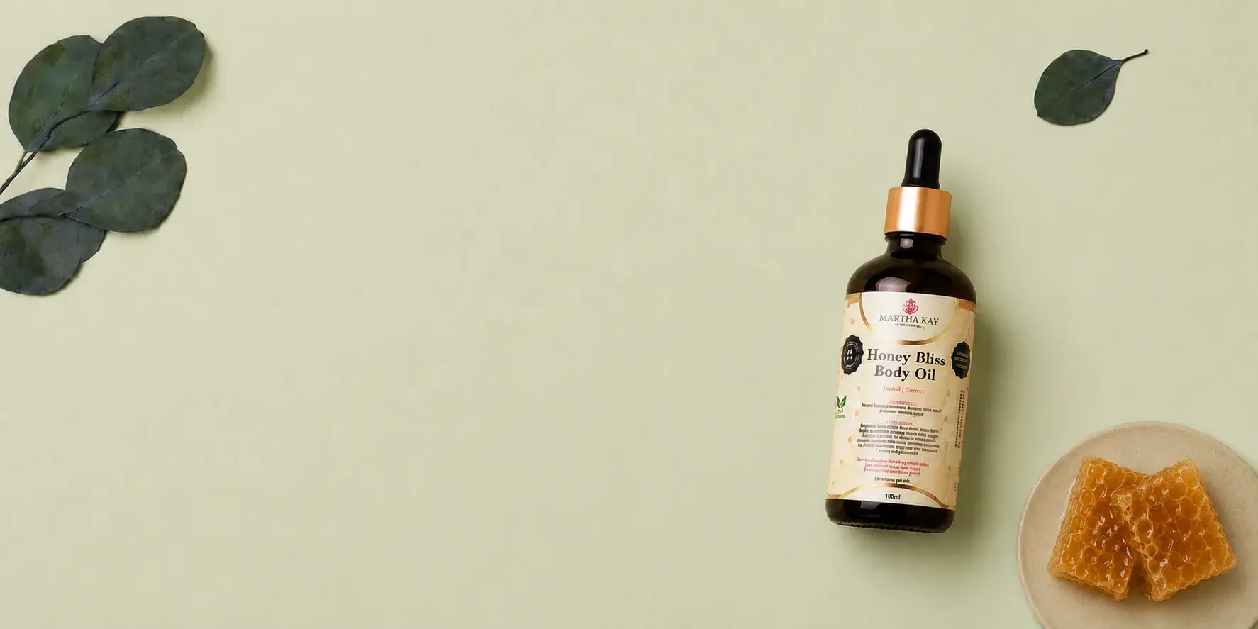Woman holding the Martha Kay Hydrating Serum, dropper raised